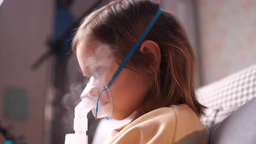 Child Receives Nebulizer Treatment