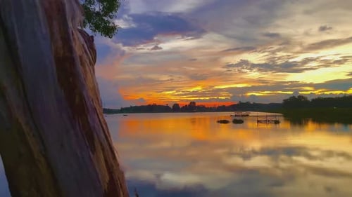 Beautiful sunset over the calm lake water
