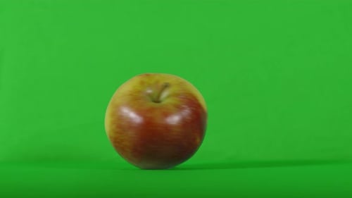 Fresh Apple Spinning on Green Screen Background
