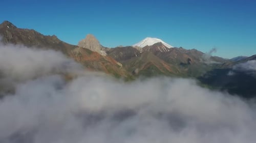 Aerial View of Clouds and Mountains at Sunrise