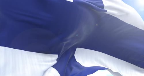 Realistic Waving Flag of Finland on Blue Sky Background