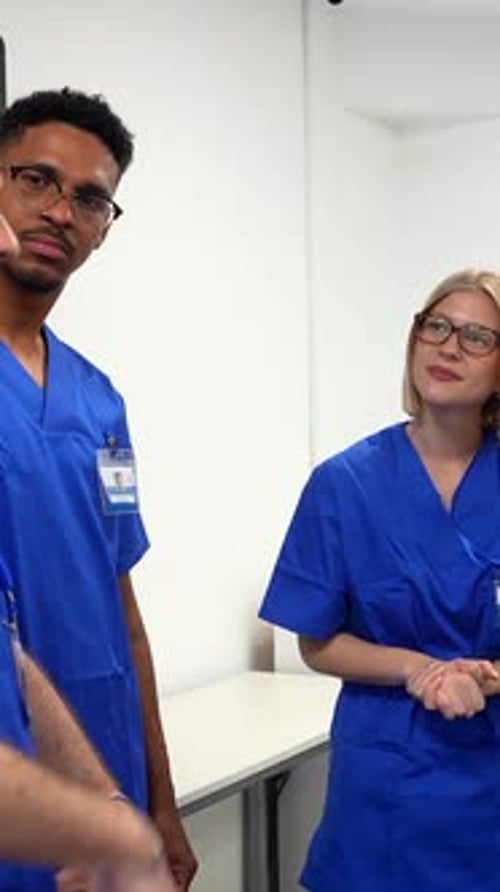 Medical team discussing patient care in hospital meeting