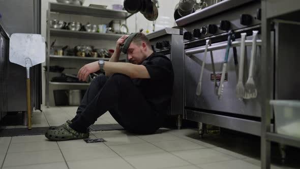 Distraught Chef Sitting on Kitchen Floor, People Stock Footage ft. chef ...