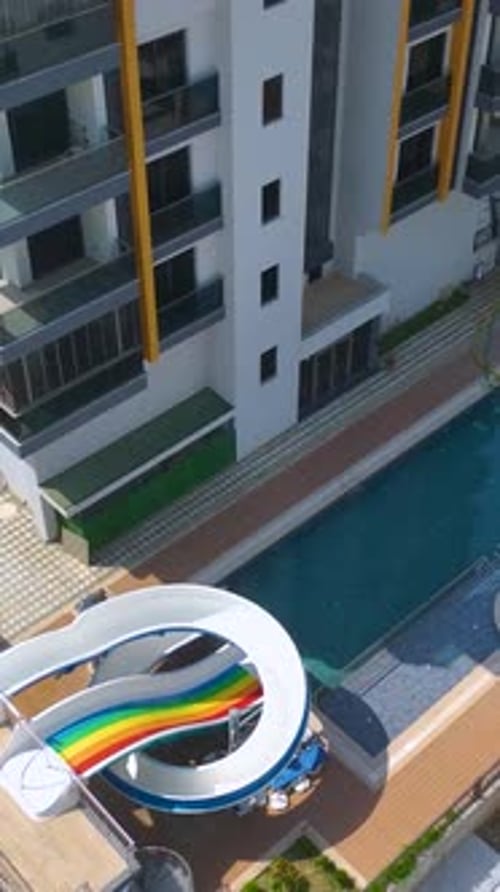 Vertical Video Modern Home With a Pool Being Filled With Fresh Clean Water