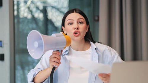Frustrated Woman Shouting into Megaphone with Documents