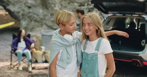 Children Smiling With Family Outdoors in Nature