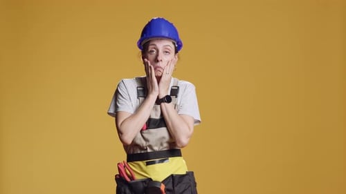 Portrait of Sleepy Tired Handywoman Working on Construction