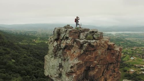 Drone of Young Free Climber and Hiker, Climbing Mountain Cliff