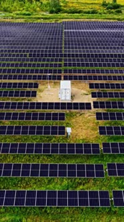 Aerial View of a Solar Farm on a Sunny Day