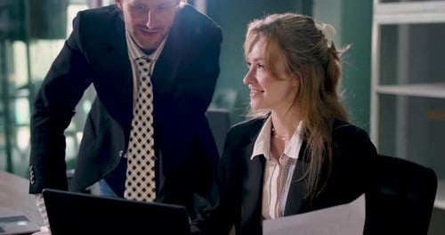 Business Colleagues Discussing Project in Modern Office