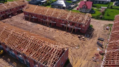 Aerial View of New House Construction Project in Suburban Area