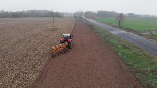 Tractor plowing the field in Ukraine