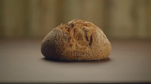 Organic Whole Grain Bread on Kitchen Table Ready for Eating