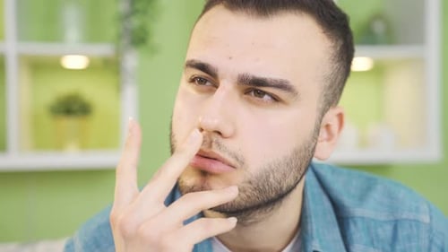 Portrait of thoughtful and confused man.