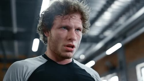 Exhausted Sportsman Making Break In Sport Club. Closeup Handsome Fighter Having Rest In Fitness C...