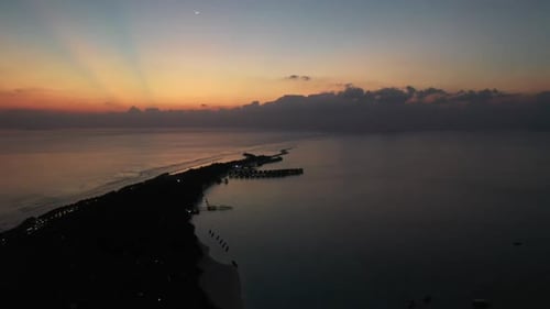 aerial view of Dramatic sea sunrise. Orange sunsets over sea video. Red sky. Summer sunset seascape.