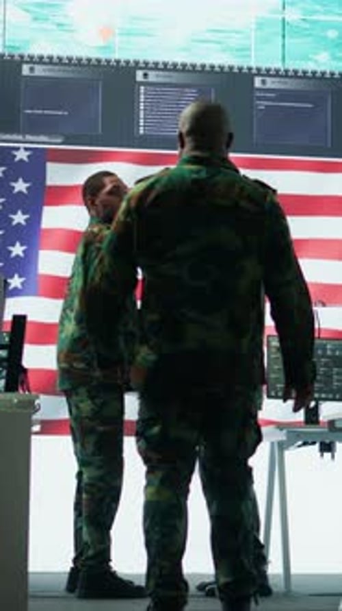 Vertical Video US Soldiers in a High Tech Command Center Protecting Classified Information