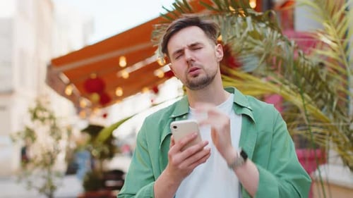 Sad Man Using Smartphone Browsing Loses Lottery Casino Application Results Bad News Fail Virus