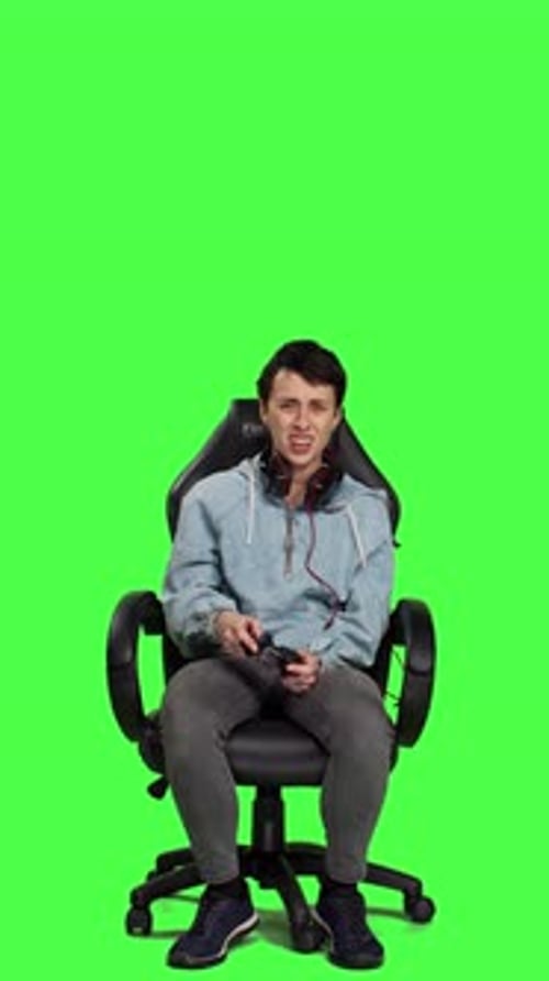 Front View Gamer Feeling Angry About Losing Video Games Competition Against Greenscreen