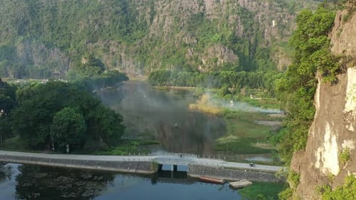 Small Boat Navigating on the Ngo Dong River in Ninh Binh Vietnam