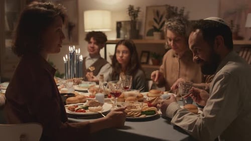 Family Shares Meal Together at Table