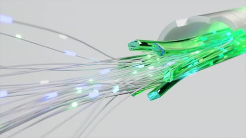 A Closeup of Green Glowing Fiber Optic Cables Highlighting Advanced Data Transmission Technology