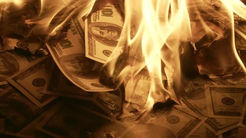 Dollar Bills are Burning Closeup