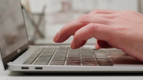 Young Woman is Typing on Computer Keyboard Closeup Modern Work Office Place Concept Working and