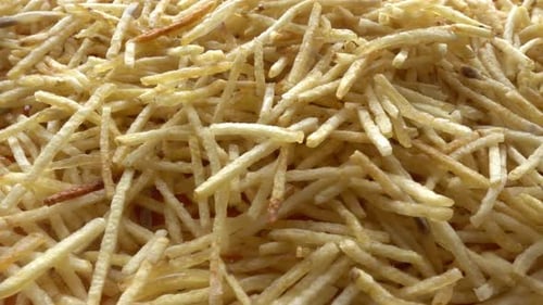 French Fries Rotates in a Circle, Fast Food Concept, Close Up