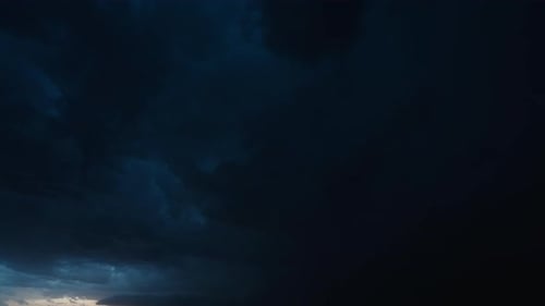 Stormy Sky with Dark Clouds and Lightning Strikes