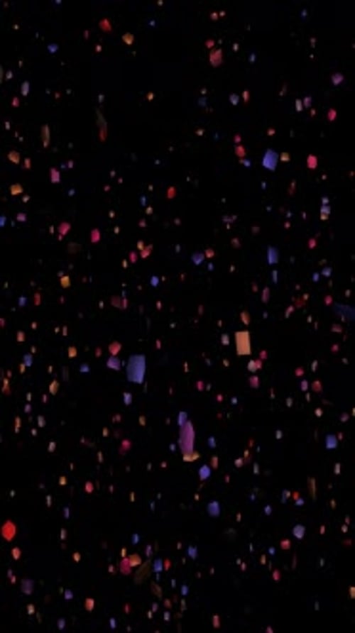 Colored Confetti Falling Down On Black Background