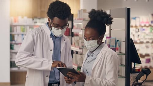 African American Man Woman Pharmacy Consultants Coworking Professional Health Care Workers Doctors