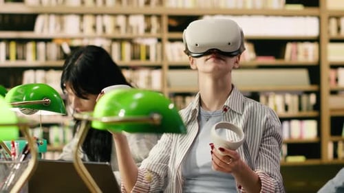 Student Using VR Device and Controller to Explore Immersive Learning