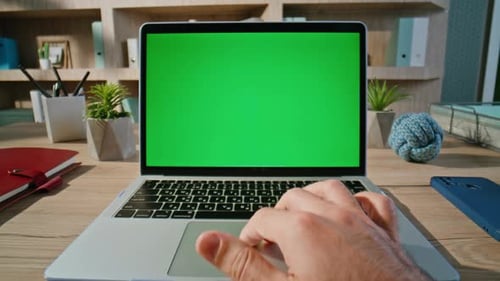 Professional Creating Project Green Screen Laptop at Home Desk Closeup Zoom in