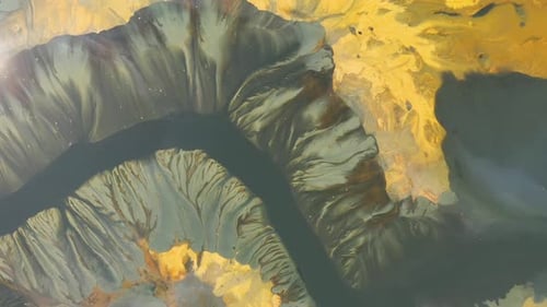 Flying over decanting lake. Colorful AMD acid mine drainage waters aerial view