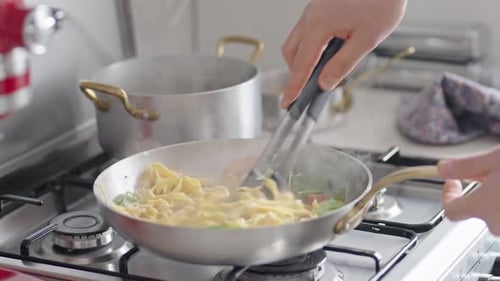 Pasta Cooking in a Pan with Vegetables