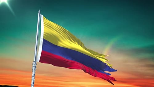 Colombian Flag Waving Against Vibrant Sunset Sky