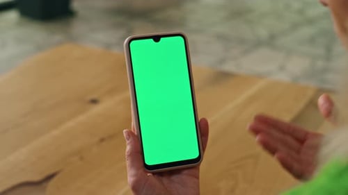 Woman Gesturing on Green Screen Smartphone Call