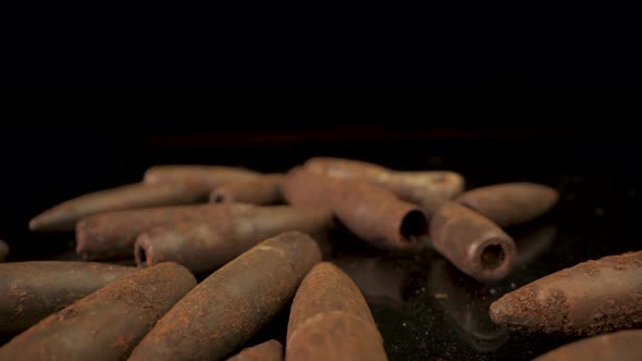 Closeup of Rusty Old Bullets on a Black Surface, Military Stock Footage ...