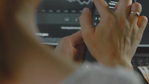 Phone with Financial App in Office Setting