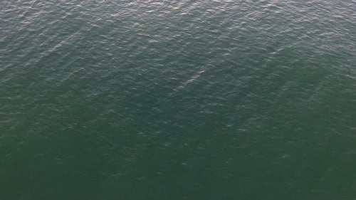 Flight Over Ocean Surface Above