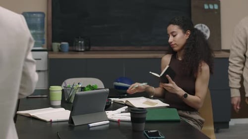 Colleagues Gathering at Office Table for Having Team Meeting
