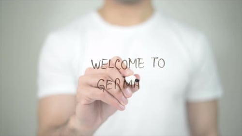Welcome to Germany, Man Writing on Transparent Screen