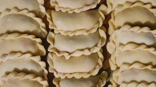 Uncooked Dumplings Ready for Cooking