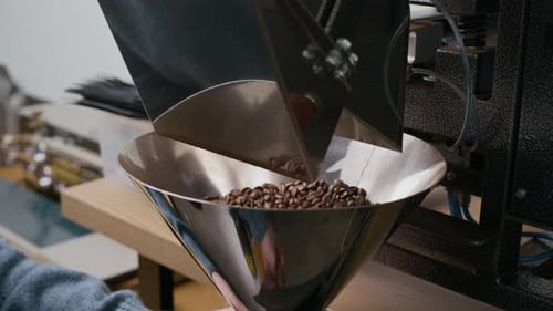 Filling Bag With Fresh Roasted Coffee Beans
