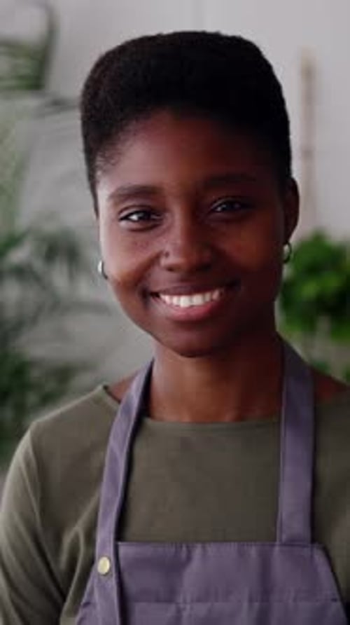Portrait of a Cheerful Young Smiling Female Small Business Owner