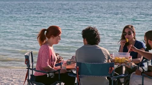 Friends Eating Together by the Beach