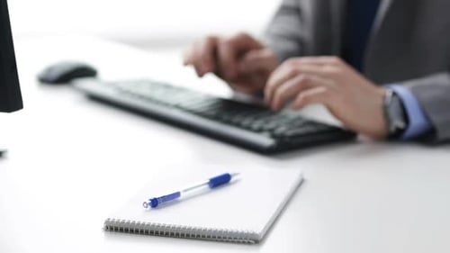 People, Business, Technology And Office Work Concept - Closeup Of Businessman Hands Typing On Com...