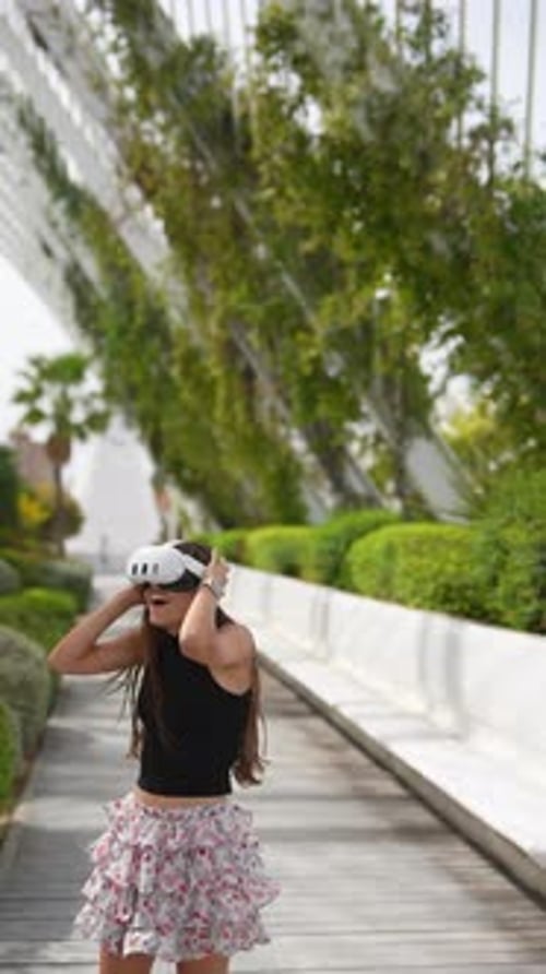 Woman Experiencing Virtual Reality Headset in Green Park