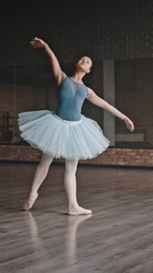 Young Woman Dancing Ballet in a Studio